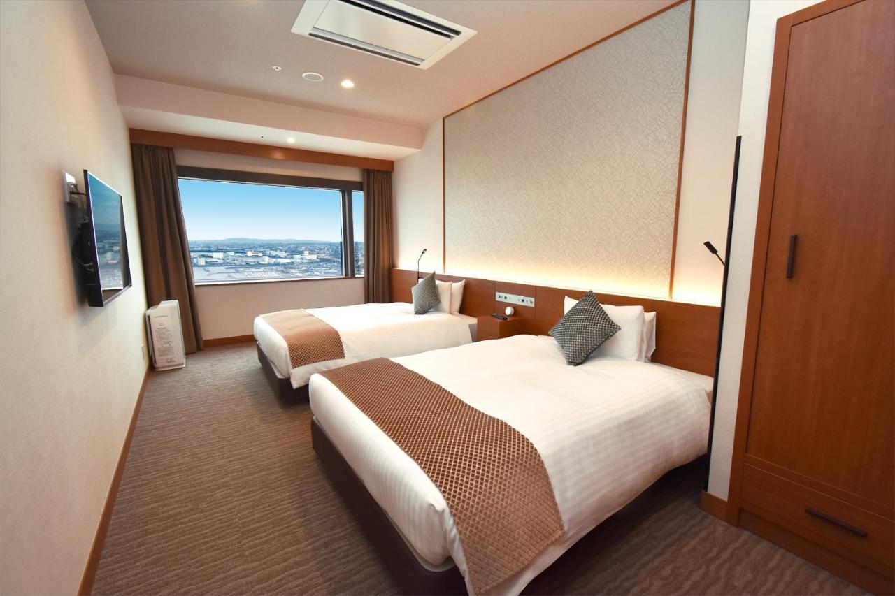 Odysis Suites Osaka Airport Hotel Izumisano Exterior foto