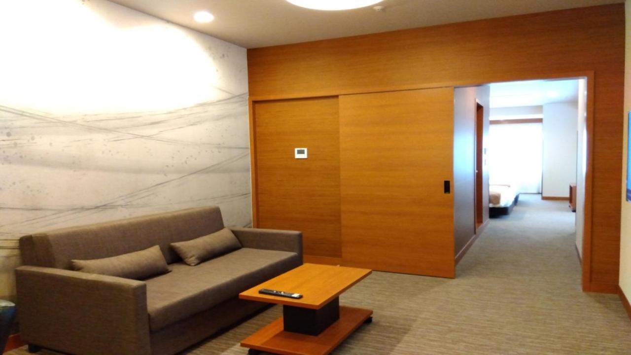 Odysis Suites Osaka Airport Hotel Izumisano Exterior foto